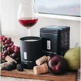 A glass of red wine candle